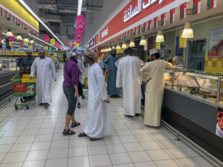 Middle-eastern men in a supermarket